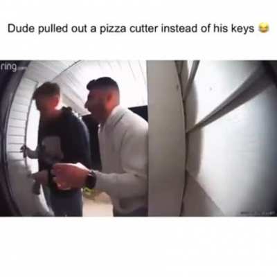 guy pulls out pizza cutter instead of keys