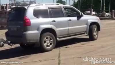 Idiot with way too much boat and not enough tow vehicle attempting to get it out of the water