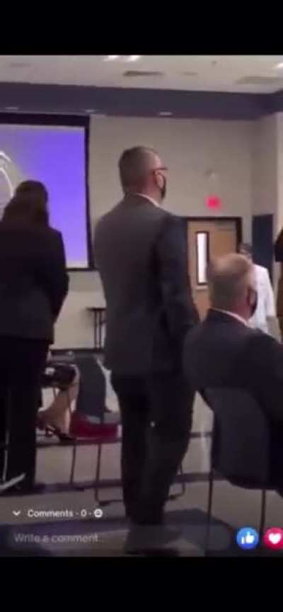 Woman carried out of Texas school board meeting for refusing to wear a mask