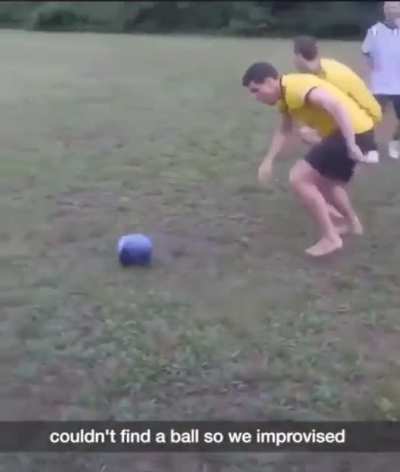 Playing football with a bowling ball