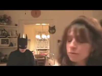 Batman doing things to his bat wife in the bat kitchen