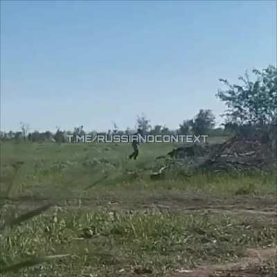 Russian Sapper throws anti-tank mine