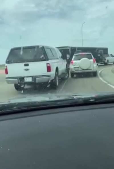 SUV wanted to pass Truck on the shoulder, doesnt end too well. Edmonton, Alberta