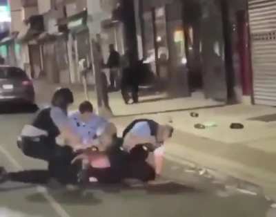 The cop literally put that man's hand on the stick just so he could have a reason to beat him up