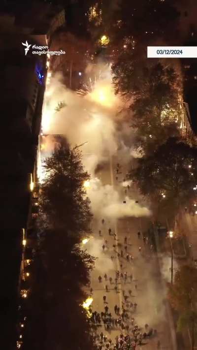 Aerial view of firework warfare during protests in Tbilisi, Georgia