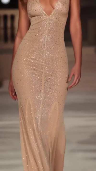 'Lighting up the runway with ‘Ameline’, designed with scattered hotfix crystals that glisten when you walk' - IG February 2026