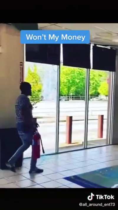 some dummy busts the windows of a business because he wanted his money back