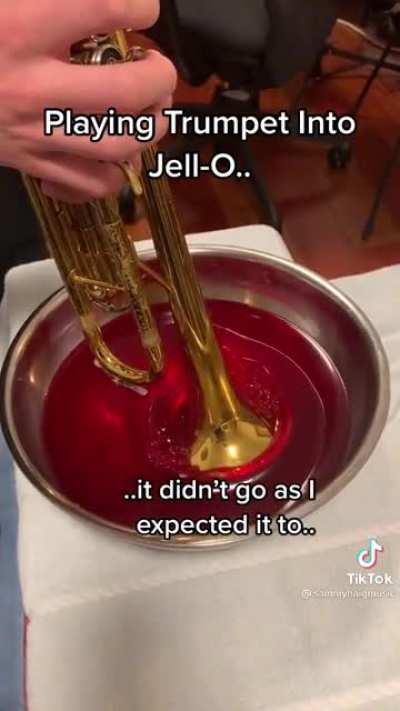 Playing trumpet in jello