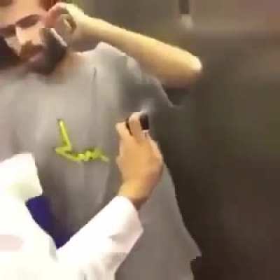 Spraying deodorant