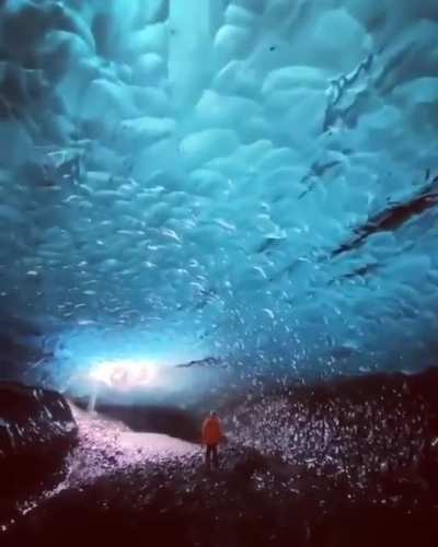 A cave under a frozen lake in Iceland