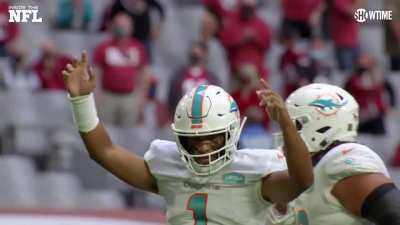 Tua Gives Flores the Game Ball