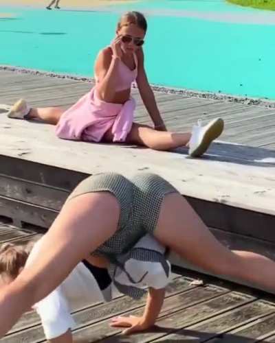 Scorpion handstand ends in downward dog