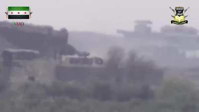 FSA 9K115 Metis team hits a group of Syrian Army soldiers who exposed themselves to watch an AA gun fire - 11/15/2014