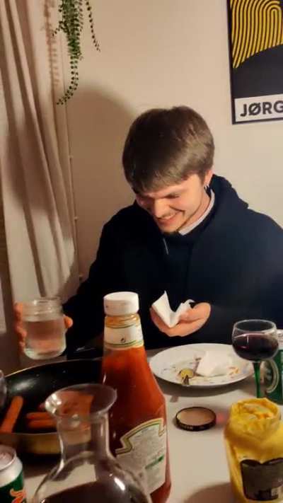 swallowing hot dog