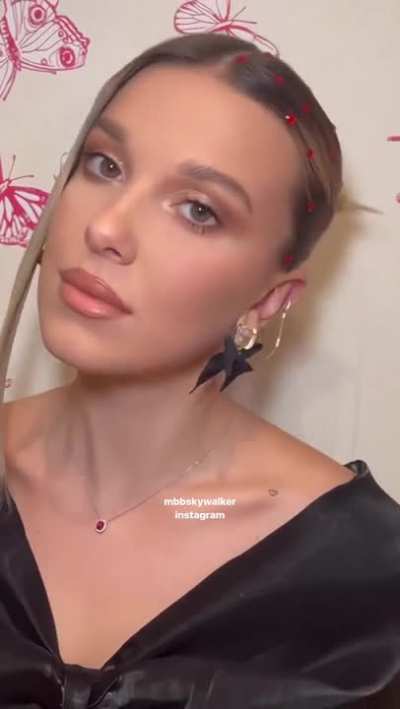 Millie Bobby Brown's full red lips look inviting