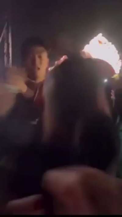 Guy throw the urine cup into the crowd