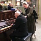 The singer happened to be walking by, and saw this lovely man playing a tune so she decided to join in. They made something spectacular.