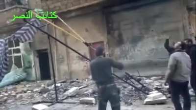 FSA engineers built a hand-crank slingshot to lob explosives at Syrian Army positions - Aleppo - 1/29/2013