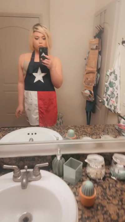 Texas flag in the front, Texas grapefruits in the back 