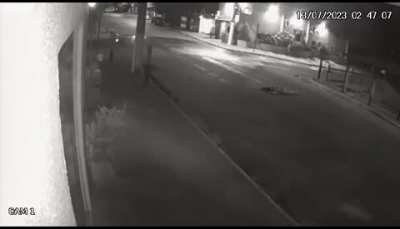 A drunk girl falls asleep in the middle of the road (July 13, 2023. Santarém, Brazil.)