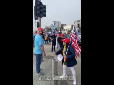 Asian Trump Supporter Tells Bystander That Biden Will F**k His Wife