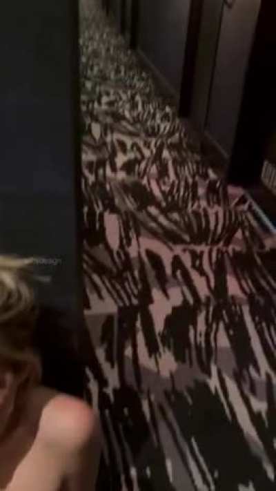 covered in cum in the hotel hallway