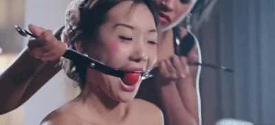 Asian girl getting gagged