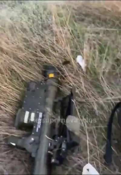 Ukrainian soldier gives a fox a snack after it tries to steal his food.