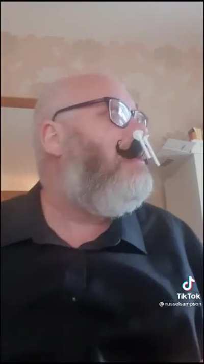 It’s the fake mustache that gets me