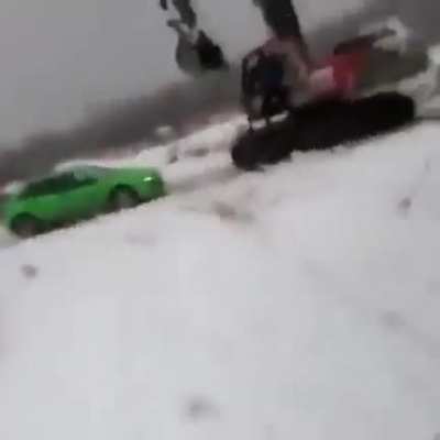 Guys punch crane driver...so he smashes their car