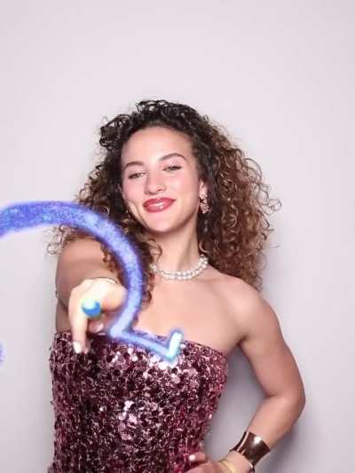 Sofie at the Hannah Montana 20th anniversary special video 2