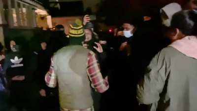 BLM protests in a residential neighborhood. Resident asks crowd not to mess with his lawn and points to his Biden sign to show he is on their side. Is informed that no one cares about his white ass opinion