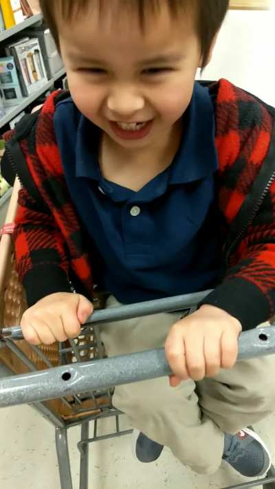 My son kept trying to get me to move my hand from the shopping cart, so we played a little game :)