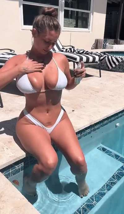 Oiling the boobs