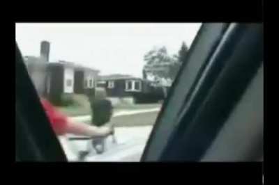 to try and hit a person on a bike with a car door....