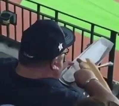When you could be watching the game but you focus your attention on a guy who’s eating a $15 hotdog with a fork...