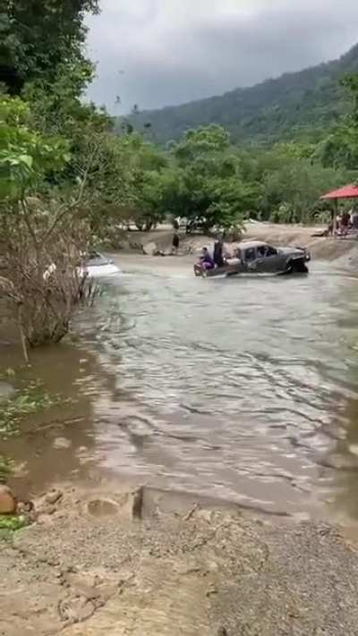 They thought they could pull an suv across the river