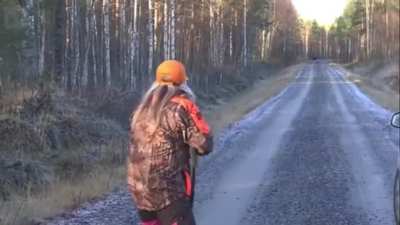 huntsman firing towards a road.