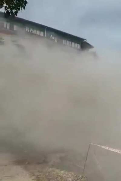 Deconstruction of a five storey building goes wrong as the building falls on the wrong side (Kathmandu, Nepal) September 2020.