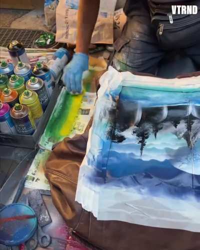 Street artist in Rome turns vintage jacket in to a masterpiece