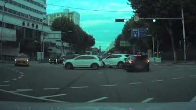 Korean lady getting the brake and acceleration mixed up after car accident