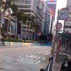 A water cannon shoots tear gas liquid mixed with blue dye towards journalists and pedestrians at the entrance of the largest Mosque in Hong Kong.