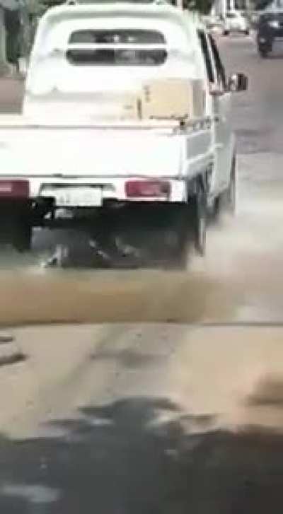 Scraps of face all over the asphalt.