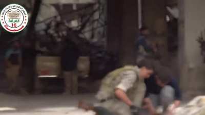 FSA fighters use a classic Toyota Technical, LMGs, and AKs to engage an occupied high rise - Aleppo - 1/27/2015