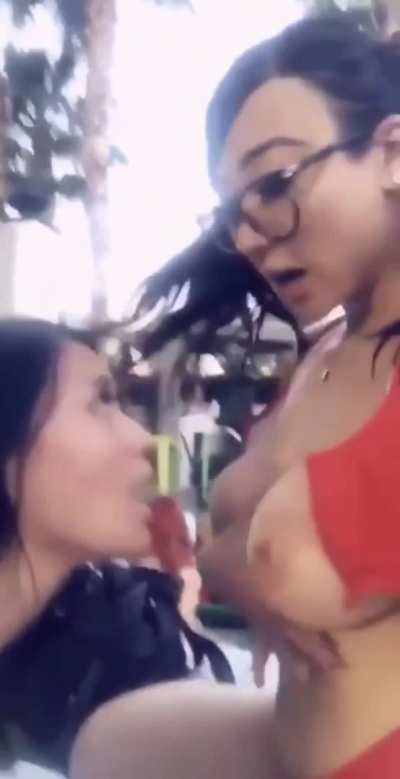 Friends enjoying each other's company at a pool party