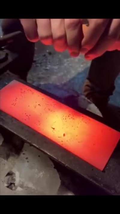 Cracking an agg over hot metal slab