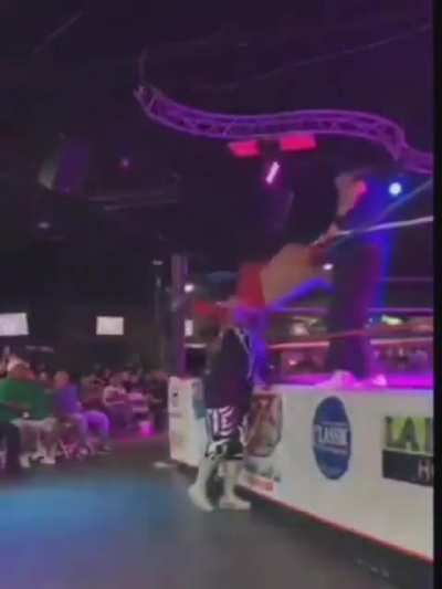 To perform a diving wrestling maneuver