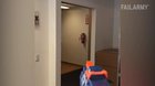 Cameraman shoots coworker with nerf gun, almost kills him.