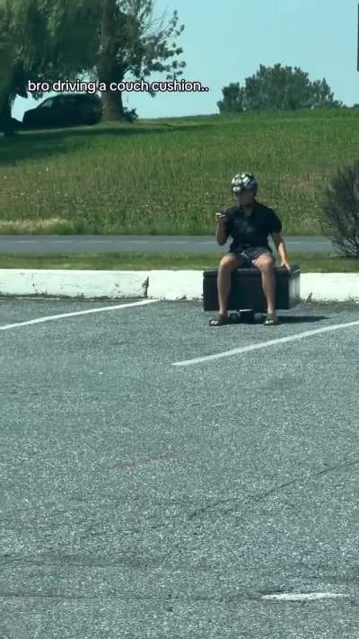 Bro driving a couch cushion