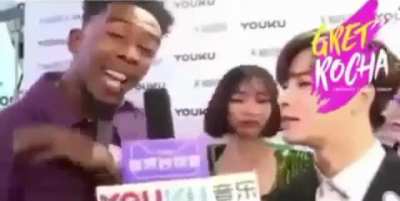 Girl on the back thinks he is rapping